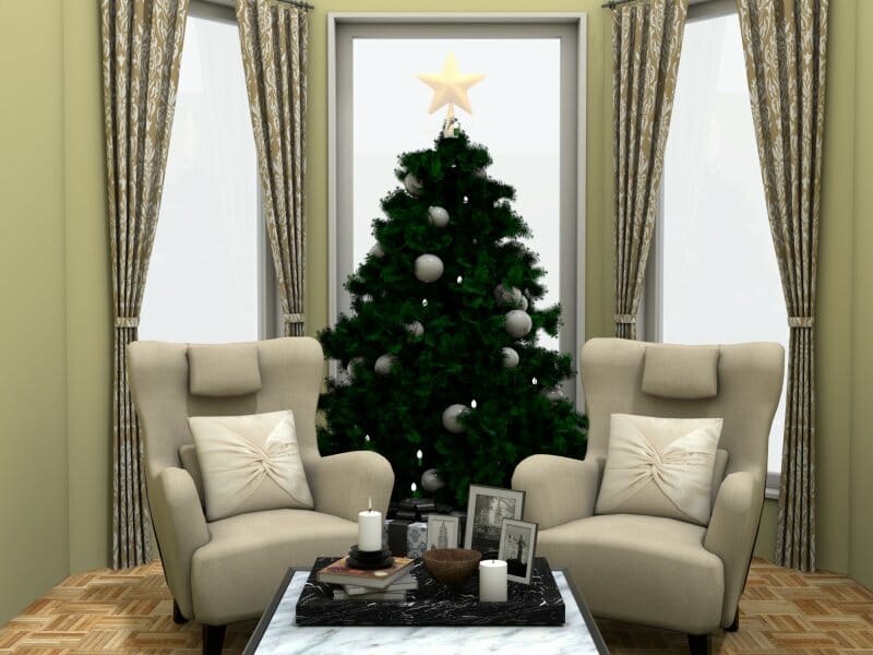 Christmas tree by large windows